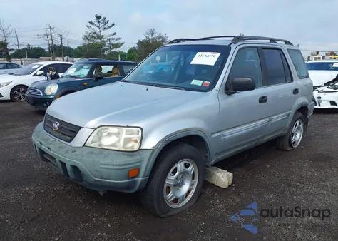 1999 Honda Cr-V Lx z USA, uszkodzony, nr VIN JHLRD1841XC024361